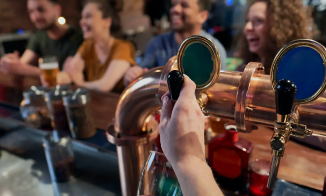 close-up-of-bartender-serving-beer-at-bar-2026-03-13-05-34-27-utc copy